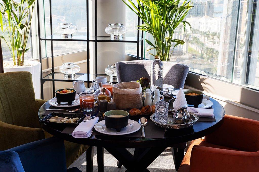 Mandarin Palace Hotel & Spa Tangeri Esterno foto A table set for afternoon tea at the Mandarin Oriental, Hong Kong